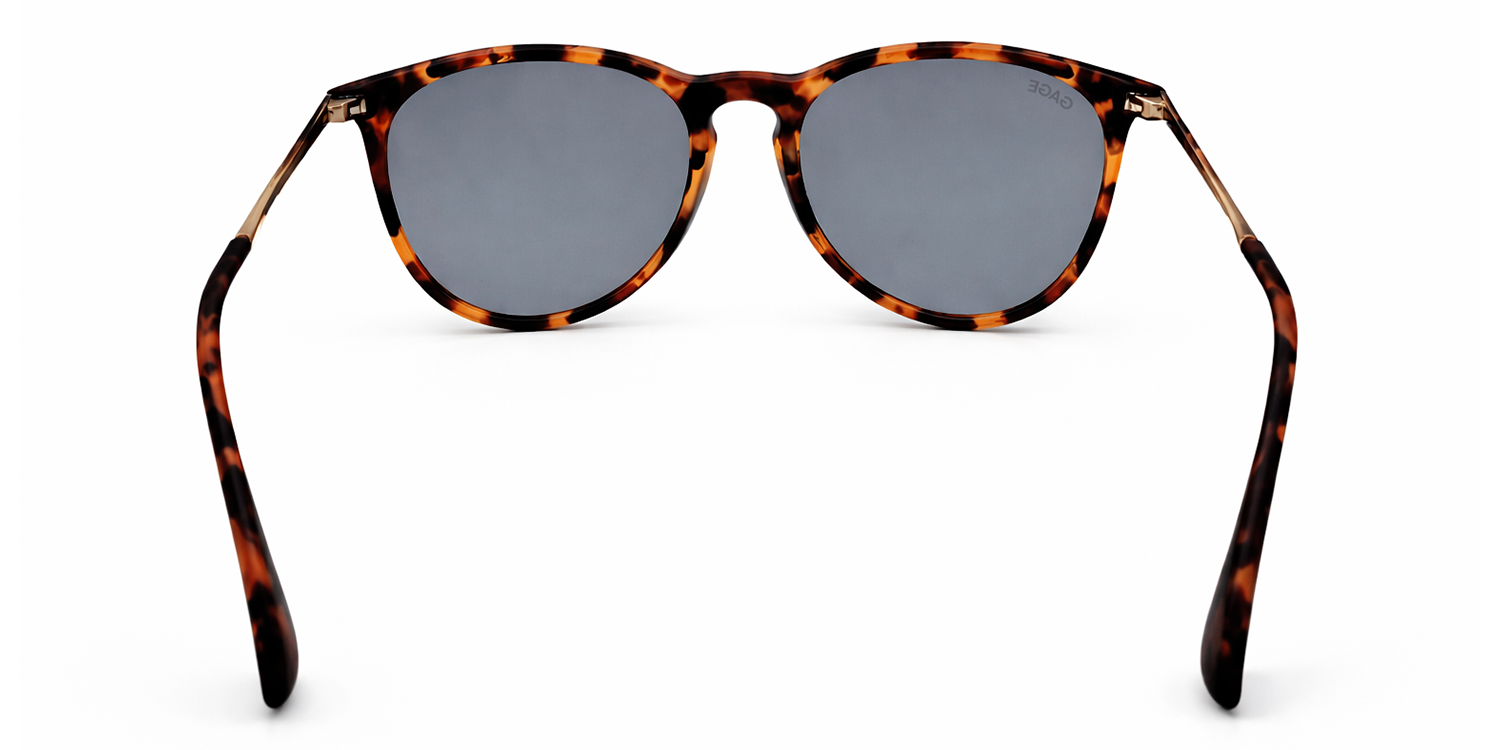 Sunglasses with tortoiseshell frame and dark lenses on a white background
