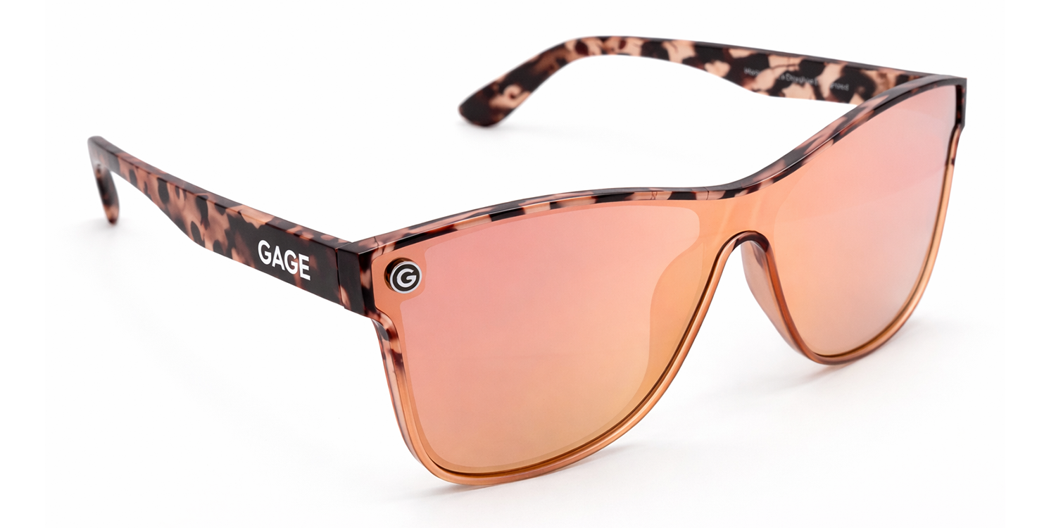 Sunglasses with a tortoiseshell frame and champagne lenses on a white background