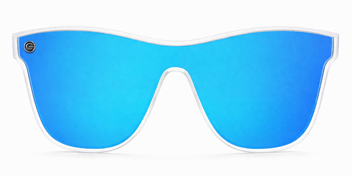 Sunglasses with blue reflective lenses and clear frame on a white background
