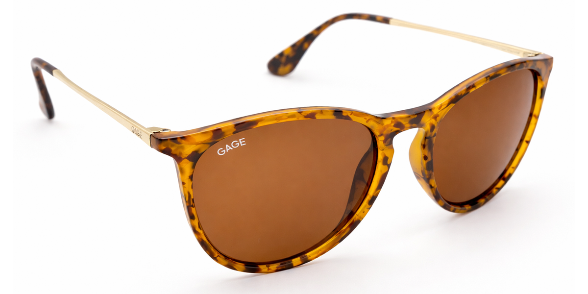 Sunglasses with tortoiseshell frame and brown lenses on a white background