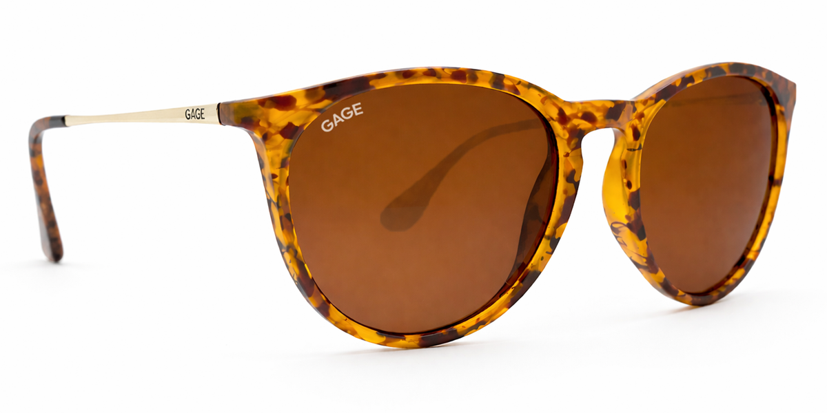 Sunglasses with tortoiseshell frame and brown lenses on a white background