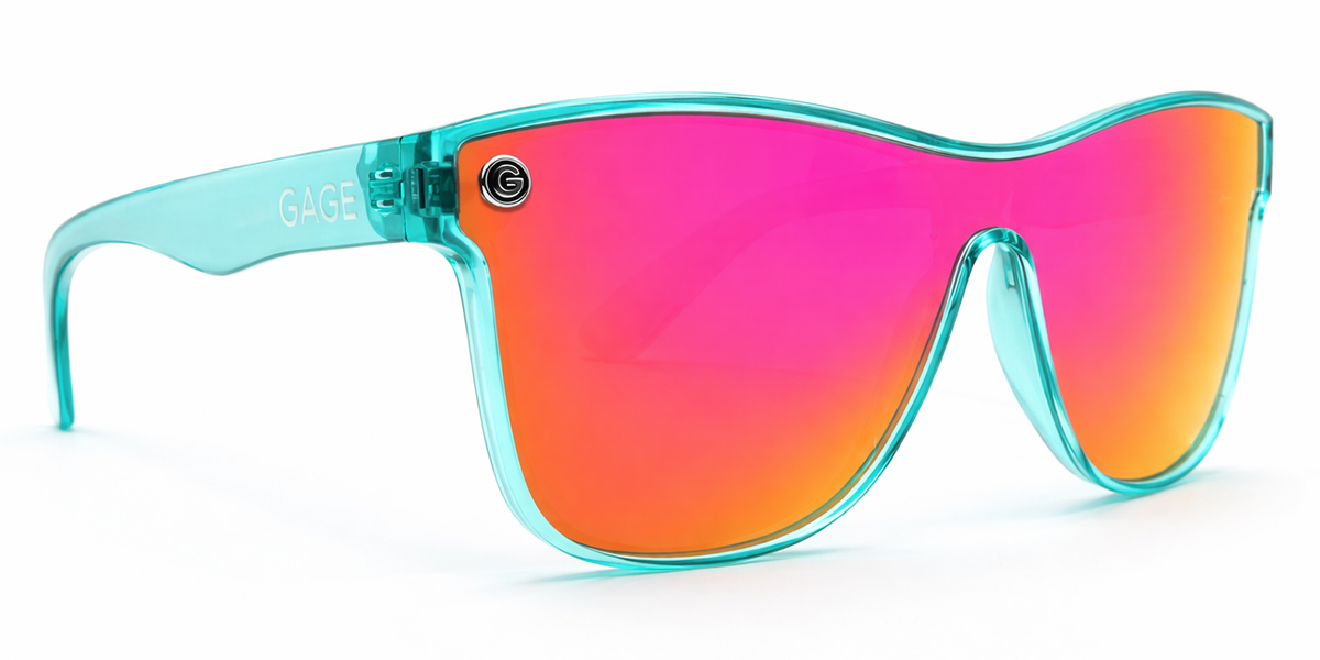Sunglasses with turquoise frame and pink-orange reflective lenses on a white background