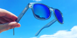 Grey Sunglasses With Light Blue Mirrored Lenses
