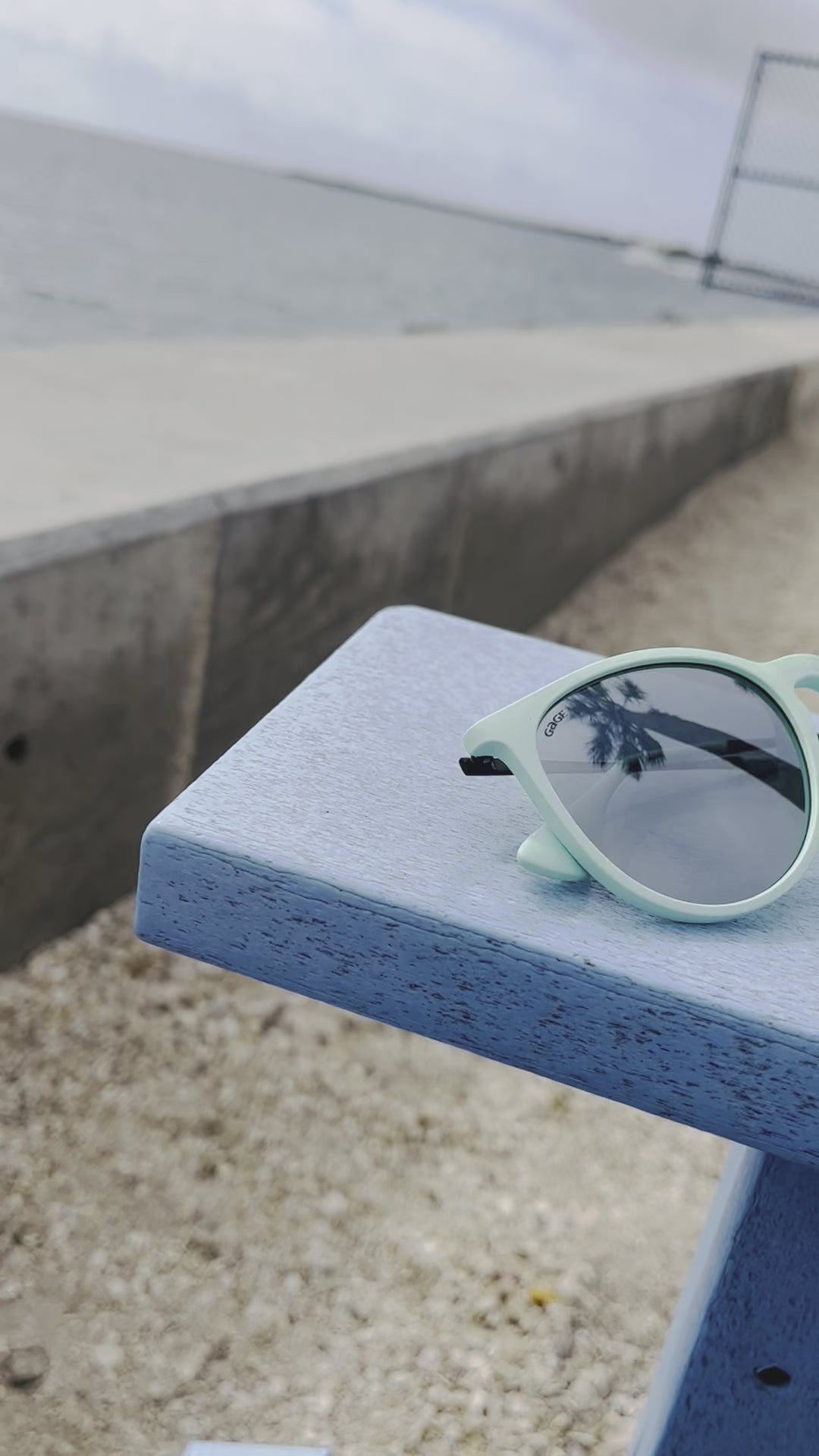 Teal Sunglasses With Black Metal Arms and Polarized Silver Mirror Lenses