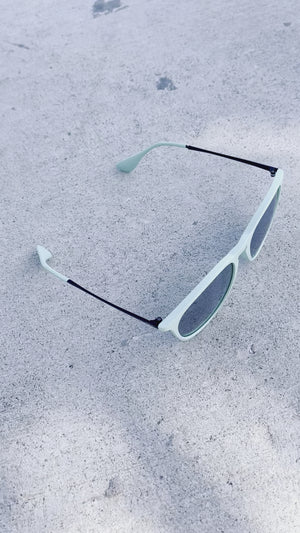 Teal Sunglasses With Black Metal Arms and Polarized Silver Mirror Lenses