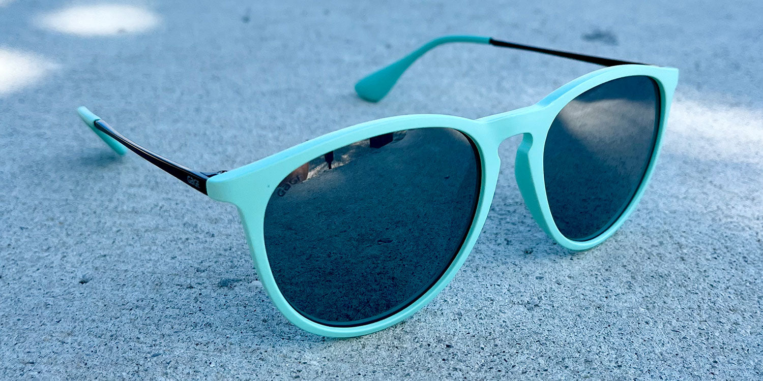 Teal Sunglasses With Black Metal Arms and Polarized Silver Mirror Lenses