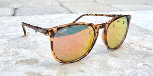 Glossy Peach Tortoise Shell Sunglasses With Champagne Lenses